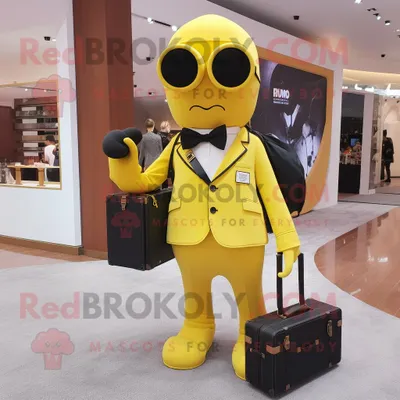 Immagine prodotto di Personaggio del costume della mascotte REDBROKOLY della macchina fotografica gialla vestito con pantaloni e borse