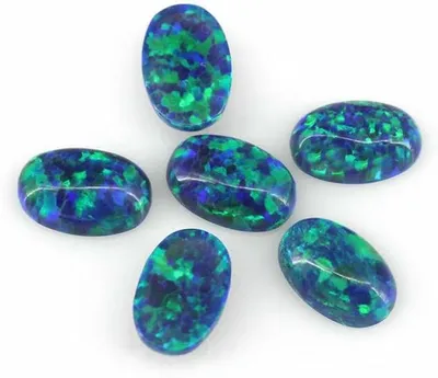 Imagen del producto de Opales sintéticas de 4x6 mm a 7x9 mm, ovaladas, con forma de cabujón y base plana, piedras semipreciosas para joyería – OP13-6x8 mm, 10 unidades