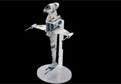 Produktbild von Revell Modellbau 1:72 B-Wing Fighter Sternjäger - Pilotenfigur - Displayständer