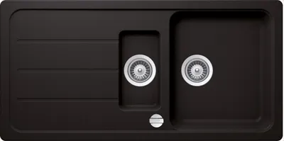 A top-down view of a black kitchen sink with two basins and a drainboard.