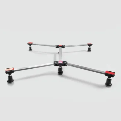 A product shot of a shower tray base with adjustable feet against a white background.