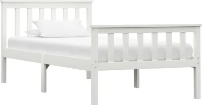A white wooden bed frame with a white mattress and pillow is shown against a white background.