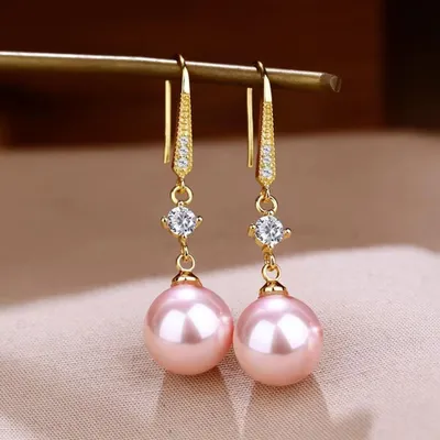Produktbild von Lange, hängende Ohrringe – ein stilvolles Schmuckstück für Damen