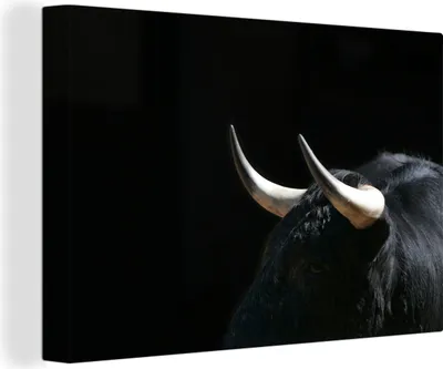 Produktbild von OneMillionCanvasses® - Leinwandbilder - 150x100 cm, Ein Foto von einem schwarzen Stier vor einem schwarzen Hintergrund, Wandbilder Kunstdruck Wanddekoration