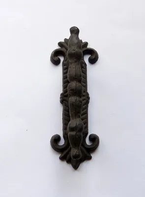 A single, antique-style door handle is displayed against a plain white background.