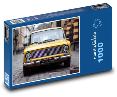 Produktbild von Puzzle 1000 Gelbes historisches Auto in der Straße - martinpuzzle