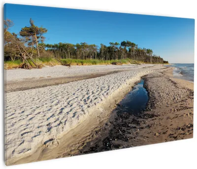 Produktbild von Wallario Premium Leinwandbild Einsamer Strand am Meer - Blauer Himmel in Größe 60 x 90 cm