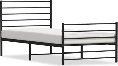 A black metal bed frame with a white mattress, shown from a side angle.