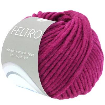 A ball of magenta yarn with a label.