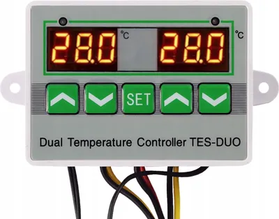 A digital dual temperature controller with LED displays and control buttons.