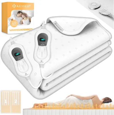 A white electric blanket folded on a mattress, with two controllers attached. A box with product information and a person lying on a bed are also visible.