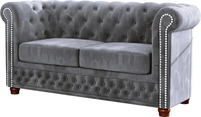 A gray velvet Chesterfield sofa is shown against a white background.