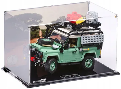 Zdjęcie produktu dla Czarna witryna z nadrukowanym panelem tylnym, przeznaczona do zestawu LEGO® ICONS 10317 – Land Rover Defender 90