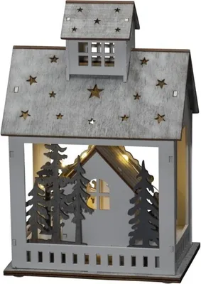 Produktbild von Konstsmide 3278-210 LED Holzsilhouette "Haus und Markt", weiß, 6H Timer, 10 warm weiße Dioden, batteriebetrieben, Innen, 2 x AA 1.5V (exkl.)