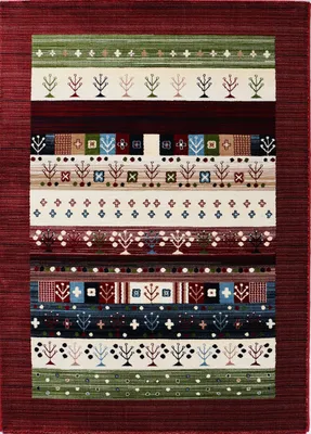 A flat lay of a rectangular rug with a dark red border and a colorful striped pattern with tree-like motifs.