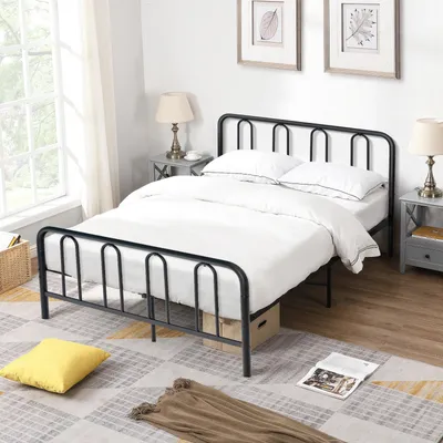 A black metal bed frame with white bedding is shown in a bedroom setting with a window and nightstands.