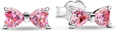 A pair of pink bow-shaped stud earrings with silver settings, shown from two different angles against a white background.