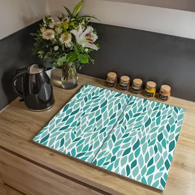 Zdjęcie produktu dla Dwuczęściowa osłona kuchenki Banjado, każda o wymiarach 30 x 52 cm, z gumowymi podkładkami dystansowymi, szkło bezpieczne ESG z motywem liści w kolorze miętowym [HAP2 11590]