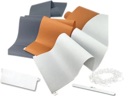 A collection of vertical blind slats in different colors and some accessories.