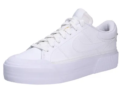 A white Nike Court Legacy Lift sneaker is shown against a white background.
