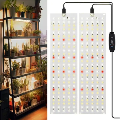 A plant shelf with plants and a grow light panel.