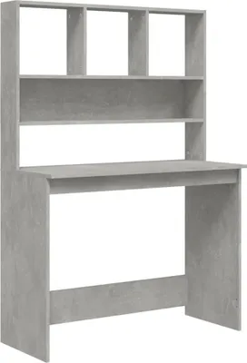A studio shot of a gray wooden desk with shelves.