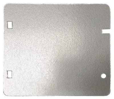 A flat, metallic plate with cutouts and a hole, presented against a light gray background.