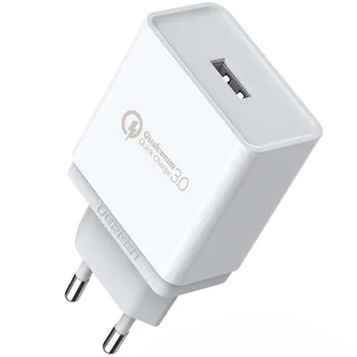 A white Ugreen USB wall charger with Qualcomm Quick Charge 3.0 technology.