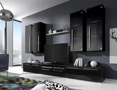 A modern living room with a black entertainment unit and TV.