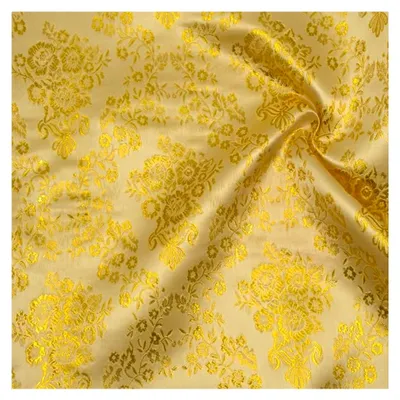 Produktbild von Polyester Jacquard mit goldenen Blumenranken -  Standard 100 - Meterware, Farbe Gold - für Bekleidung und Dekorationen