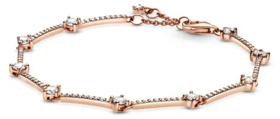 Imagen del producto de Pulsera PANDORA con varillas pavé brillantes en oro rosa, con detalles en metal bañado en oro rosa de 14 quilates