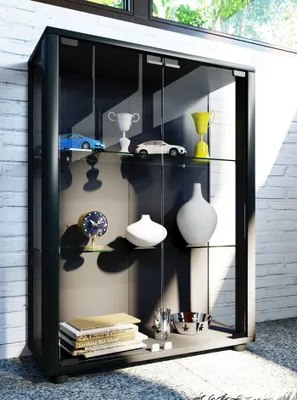 A glass display cabinet filled with decorative items.