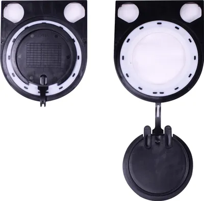 Two views of a black and white vacuum cleaner dust bag holder, one open and one closed, against a white background.