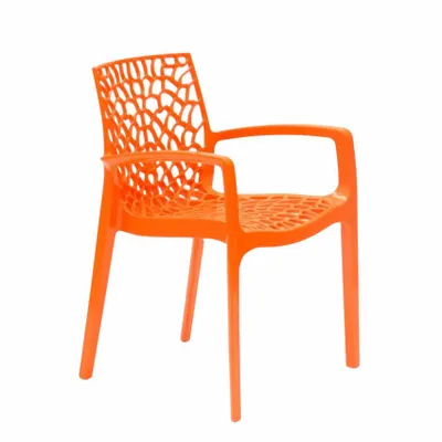 An orange plastic chair with an openwork design.