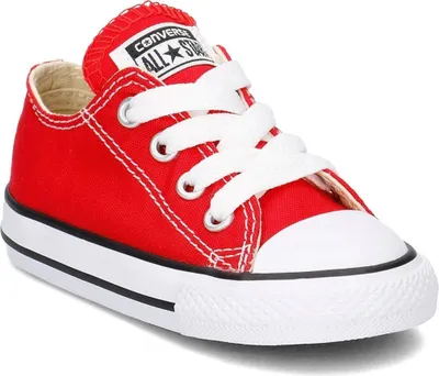A single red Converse Chuck Taylor All Star sneaker for children is shown from a side-angle on a white background.
