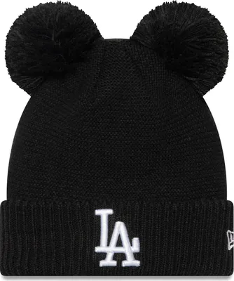 A black winter hat with two pom-poms on top and the LA Dodgers logo on the front.