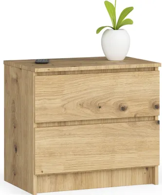 A wooden nightstand with two drawers and a plant on top.