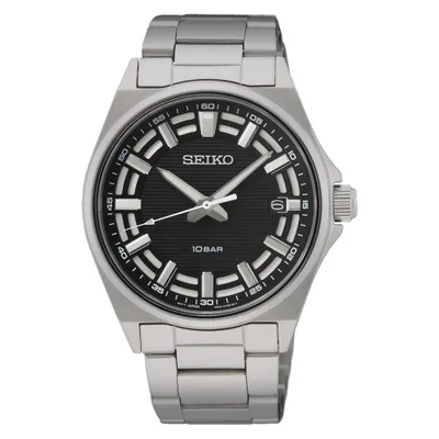A close-up studio shot of a men's wristwatch.