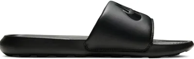 A side view of a black Nike slide sandal.