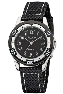 A close-up studio shot of a black analog watch with a black fabric strap.