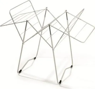 A white metal drying rack for clothes, shown from a slightly elevated angle.