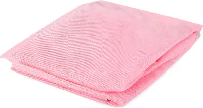 A folded pink mesh fabric, likely a beach mat, lying on a white surface.