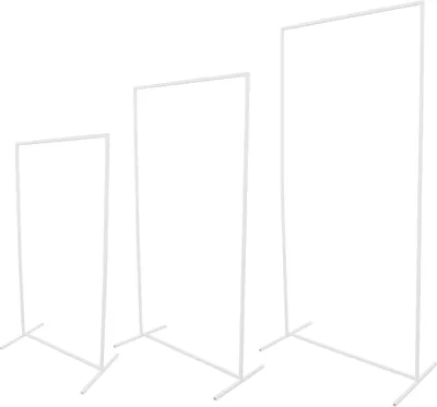 Three white metal stands of varying heights against a white background.