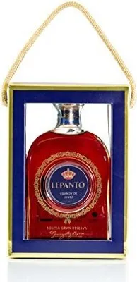 A bottle of Lepanto Solera Gran Reserva Brandy de Jerez in a decorative gift box with a handle.