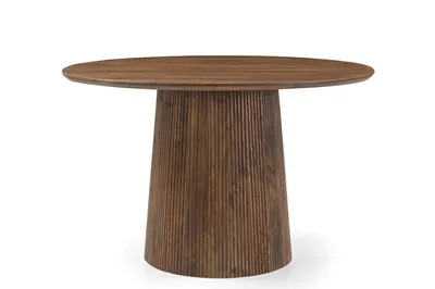 A round wooden dining table with a fluted pedestal base, shown against a white background.