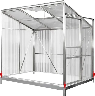 An empty greenhouse frame with transparent walls and roof, made of metal and plastic.