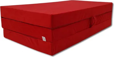 A red foldable mattress is shown on a white background.
