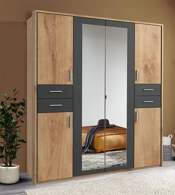 A modern wardrobe with mirrored doors and wooden accents, placed in a room with a brown wall and a white rug.