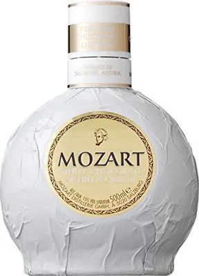 A bottle of Mozart White Chocolate Vanilla Cream liqueur, wrapped in white paper.