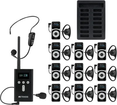 A collection of wireless audio guide system components, including transmitters, receivers, and a charging dock, arranged on a white background.